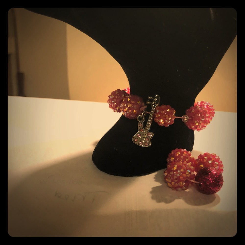 Bracelet with attached charms and ring